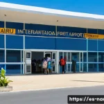 나우루 입국 절차 - A detailed scene of a traveler arriving at Nauru International Airport, showing a small tropical air...